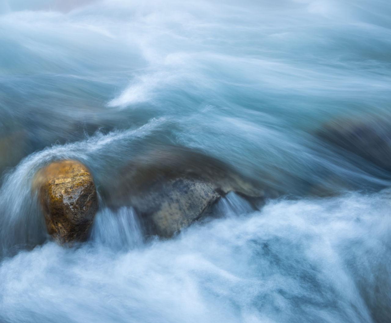 Water and golden rock